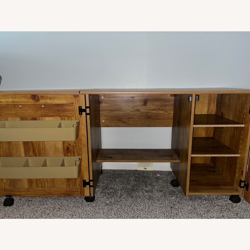 Used Dark Brown Wood Armoire for sale on AptDeco