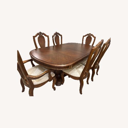 Used Dark Brown Wood Dining Sets for sale on AptDeco