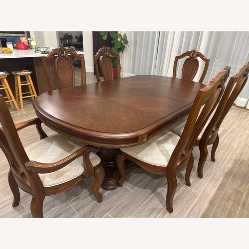 Used Dark Brown Wood Dining Sets for sale on AptDeco