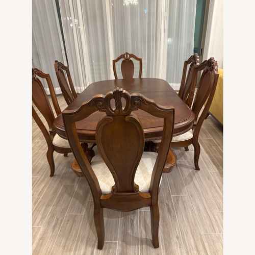 Used Dark Brown Wood Dining Sets for sale on AptDeco