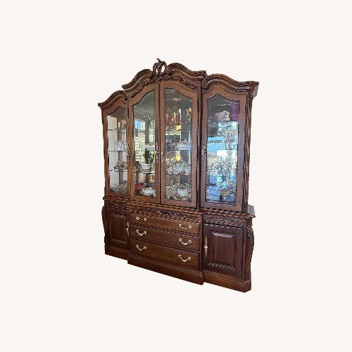 Used Dark Brown Wood Hutch Cabinet for sale on AptDeco