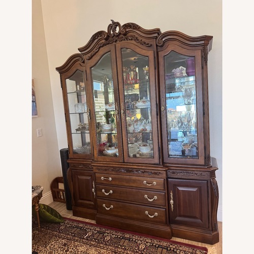 Used Dark Brown Wood Hutch Cabinet for sale on AptDeco