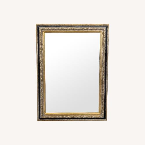 Used Wood Framed Mirror with Carving and Gilding	 for sale on AptDeco