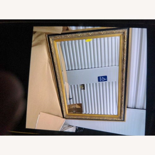 Used Wood Framed Mirror with Carving and Gilding	 for sale on AptDeco