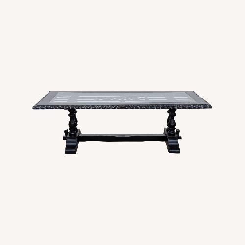 Used Peruvian Glass Top Dining Table for sale on AptDeco