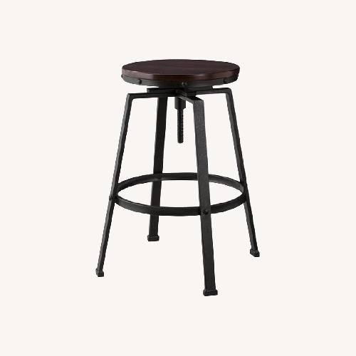 Used Wooden Industrial Swivel Bar Stools for sale on AptDeco