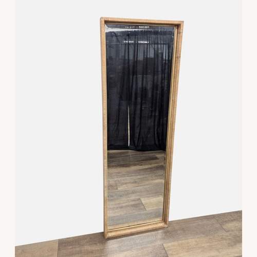 Used Uttermost Natural Rattan Floor Mirror for sale on AptDeco
