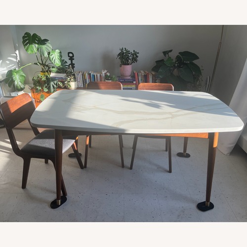 Used Mid-Century Dining Table - Granite Top for sale on AptDeco