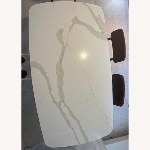 Used Mid-Century Dining Table - Granite Top for sale on AptDeco