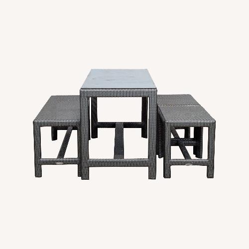 Used Dedon 4-Piece Outdoor Rattan Dining Table  for sale on AptDeco