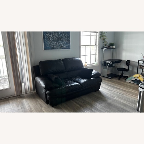 Used Softline A/S Dark Brown Loveseat for sale on AptDeco