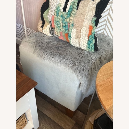 Used Light Gray Fabric Ottoman for sale on AptDeco