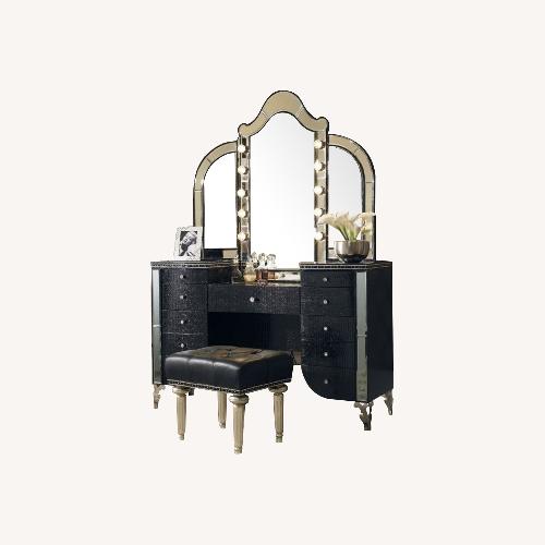 Used Michael Amini Furniture Designs Black Armoire for sale on AptDeco