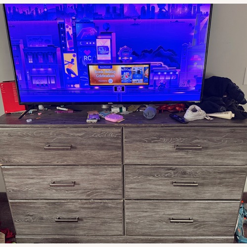 Used Dark Gray Wood Dresser for sale on AptDeco