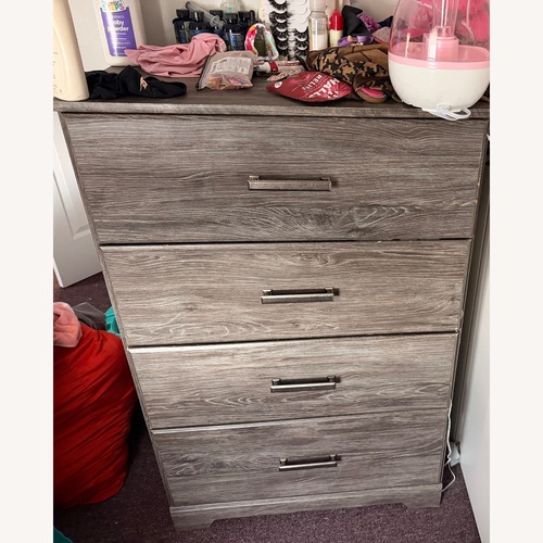 Used Dark Gray Wood Dresser for sale on AptDeco