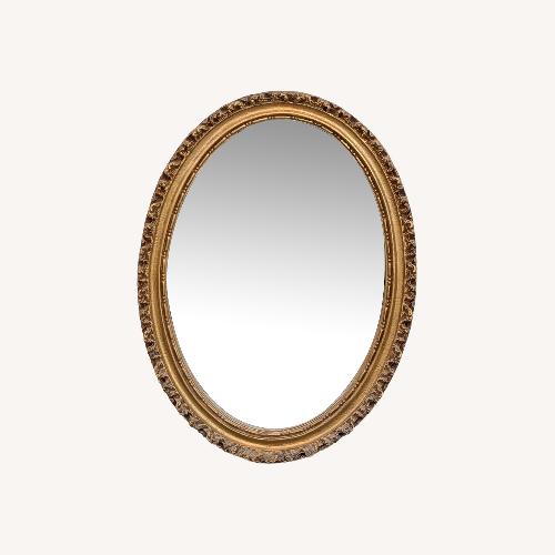Used Art Light Company Carved Oval Mirror for sale on AptDeco
