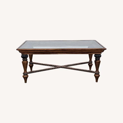 Used Macy's Glass Top Coffee Table with Bead Trim for sale on AptDeco