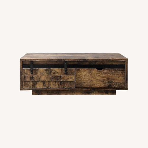 Used Chickanaw Rustic Oak Coffee Table with Sliding  for sale on AptDeco