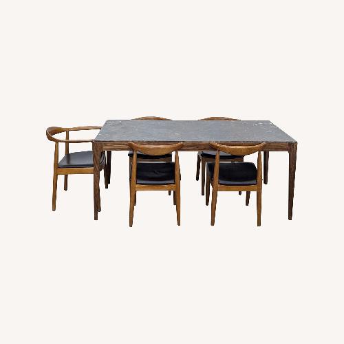 Used Pacini & Cappellini Cut Dining Table with Emperador for sale on AptDeco