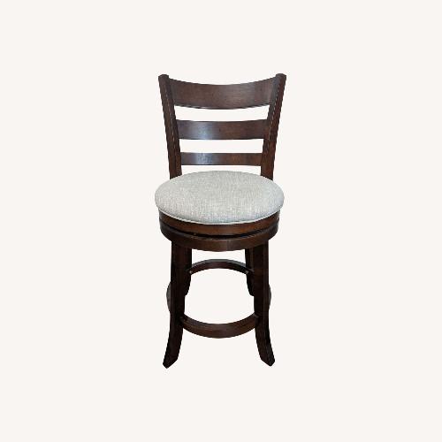Used Wood Swivel Bar Stool with Upholstered Seat Stool for sale on AptDeco