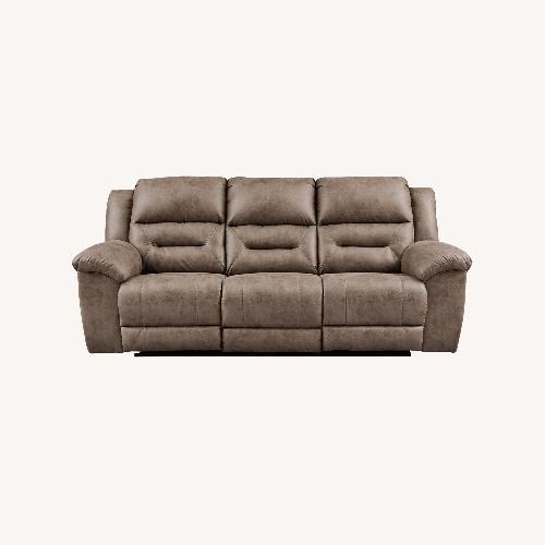 Used Ashley Furniture Stoneland Reclining Sofa for sale on AptDeco