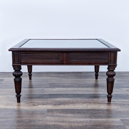 Used Glass Top Coffee Table with Turned Legs	 for sale on AptDeco