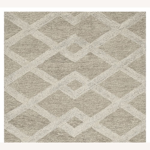 Used Pottery Barn Chase Wool Tufted Rug 5X8 for sale on AptDeco