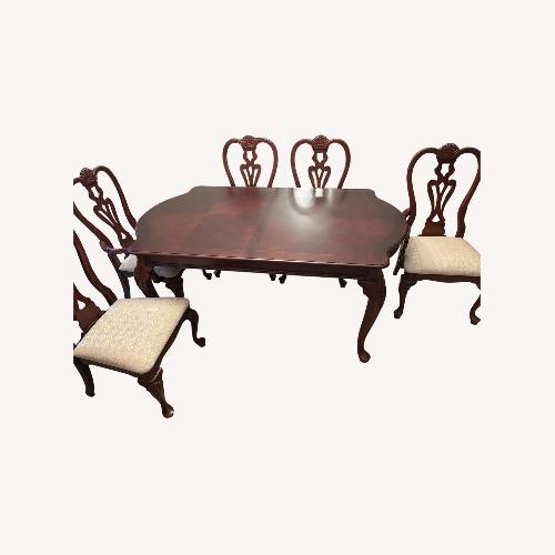 Used Universal Furniture Klingmans Wood Dining Set for sale on AptDeco
