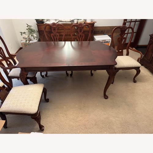 Used Universal Furniture Klingmans Wood Dining Set for sale on AptDeco