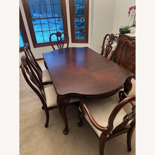 Used Universal Furniture Klingmans Wood Dining Set for sale on AptDeco