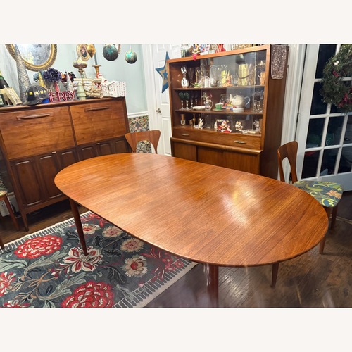 Used MCM Danish Teak Extendable Table 6 Chairs for sale on AptDeco