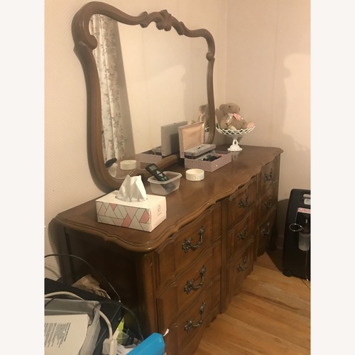 Used Vintage/Antique Finds Light Brown Wood Dresser for sale on AptDeco