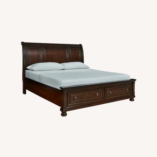 Used Ashley Porter California King Sleigh Storage Bed for sale on AptDeco