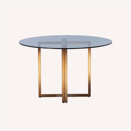 Used CB2 Silverado Round Glass Dining Table for sale on AptDeco