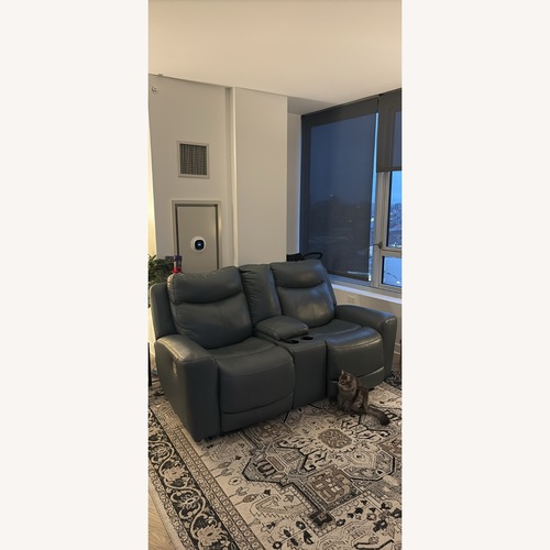 Used Ashley Furniture Dark Gray Leather 2 Seater Sofa for sale on AptDeco