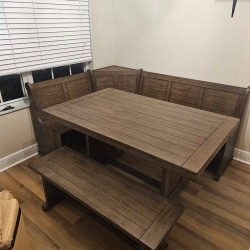 Used Dark Brown Wood Dining Table for sale on AptDeco