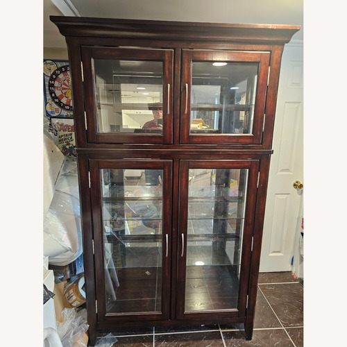 Used Dark Brown Wood Sideboard Display Cabinet for sale on AptDeco