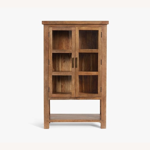 Used Pottery Barn Reed Storage Cabinet for sale on AptDeco