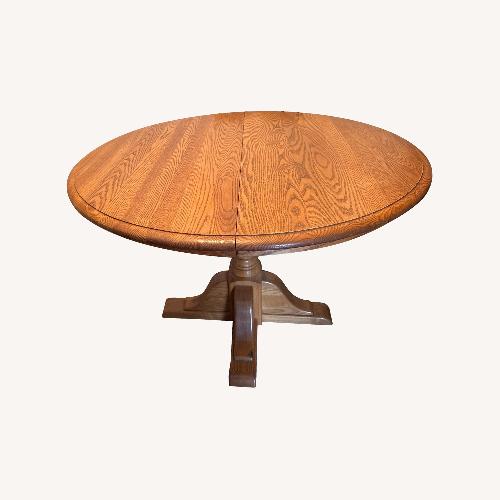 Used Vintage/Antique Dark Brown Wood Dining Table for sale on AptDeco