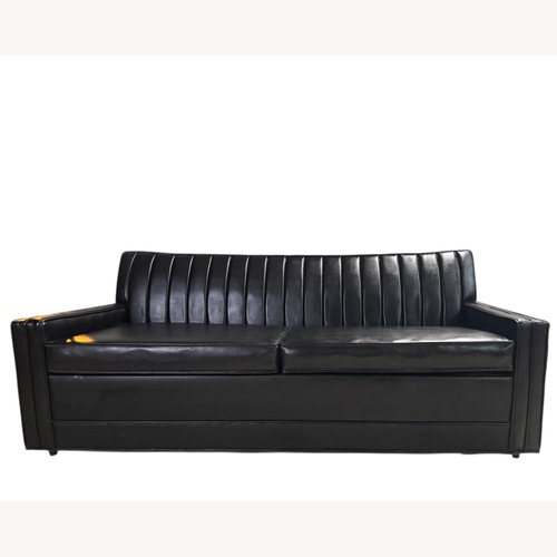 Used Mid Century Black Leather Sleeper Sofa for sale on AptDeco
