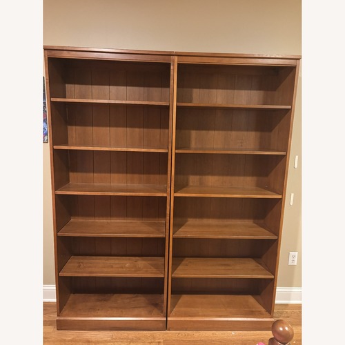 Used Pottery Barn Wood Set of 2 Bookcases for sale on AptDeco