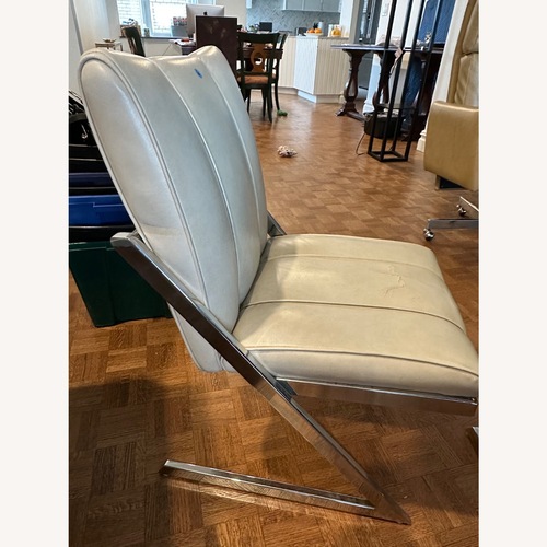 Used Natural Faux Leather Dining Chairs for sale on AptDeco