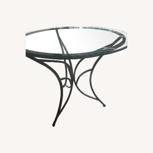 Used Glass Top Coffee Table with Iron Base for sale on AptDeco