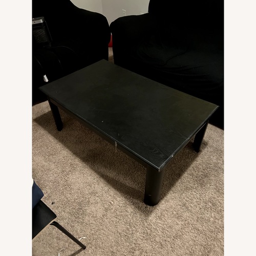 Used 100 Essentials Black Wood Coffee Table for sale on AptDeco