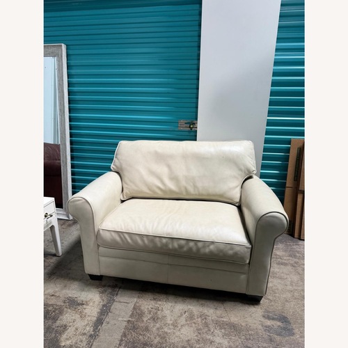 Used Light Gray Leather Loveseat & Storage Ottoman for sale on AptDeco