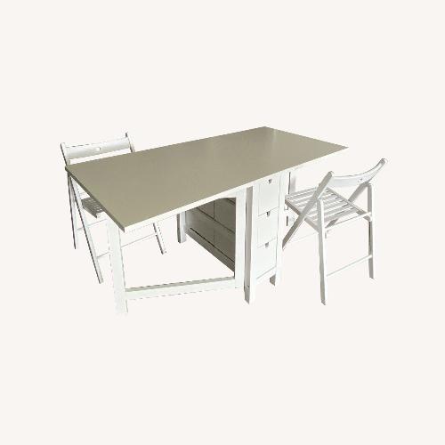 Used IKEA Folding Table With 2 Chairs for sale on AptDeco