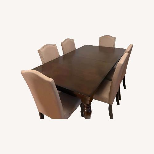 Used Dark Brown Wood Dining Set for sale on AptDeco