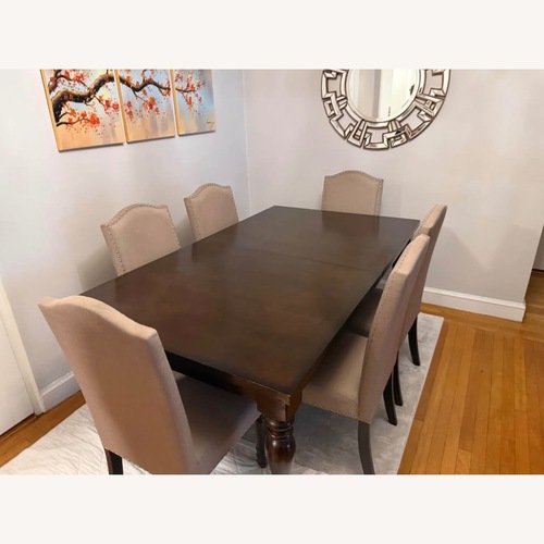 Used Dark Brown Wood Dining Set for sale on AptDeco