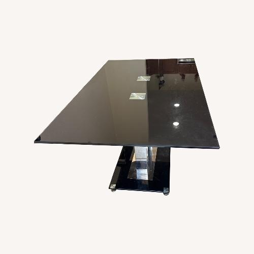 Used Black Glass Dining Table for sale on AptDeco