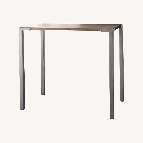 Used CB2 Stilt High Top Dark Brown Dining Pub Table for sale on AptDeco
